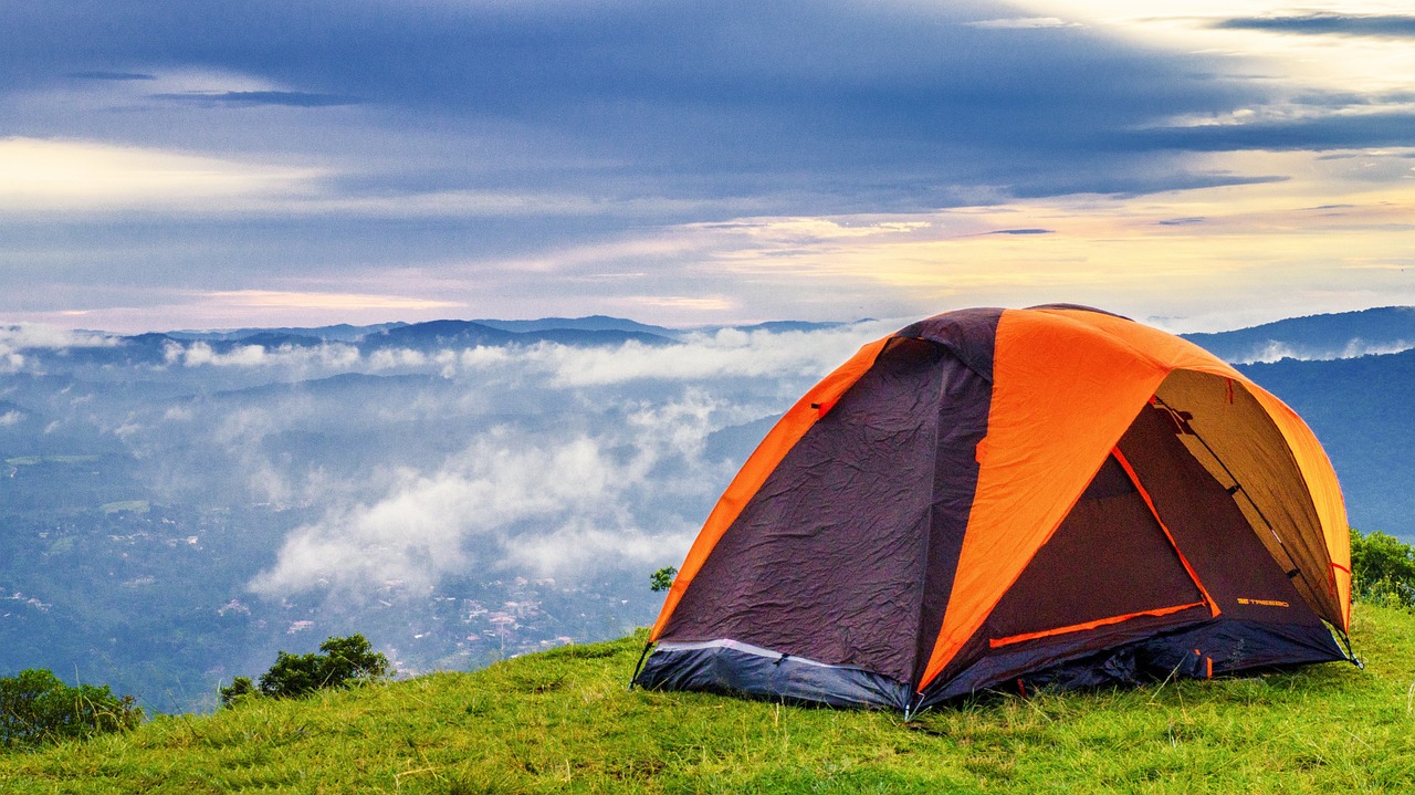 Backpacking Tent on grassy slope